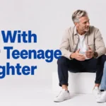 Father sitting and talking with his teenage daughter, having an open conversation