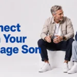 Father sitting and talking with his teenage son, building connection through conversation